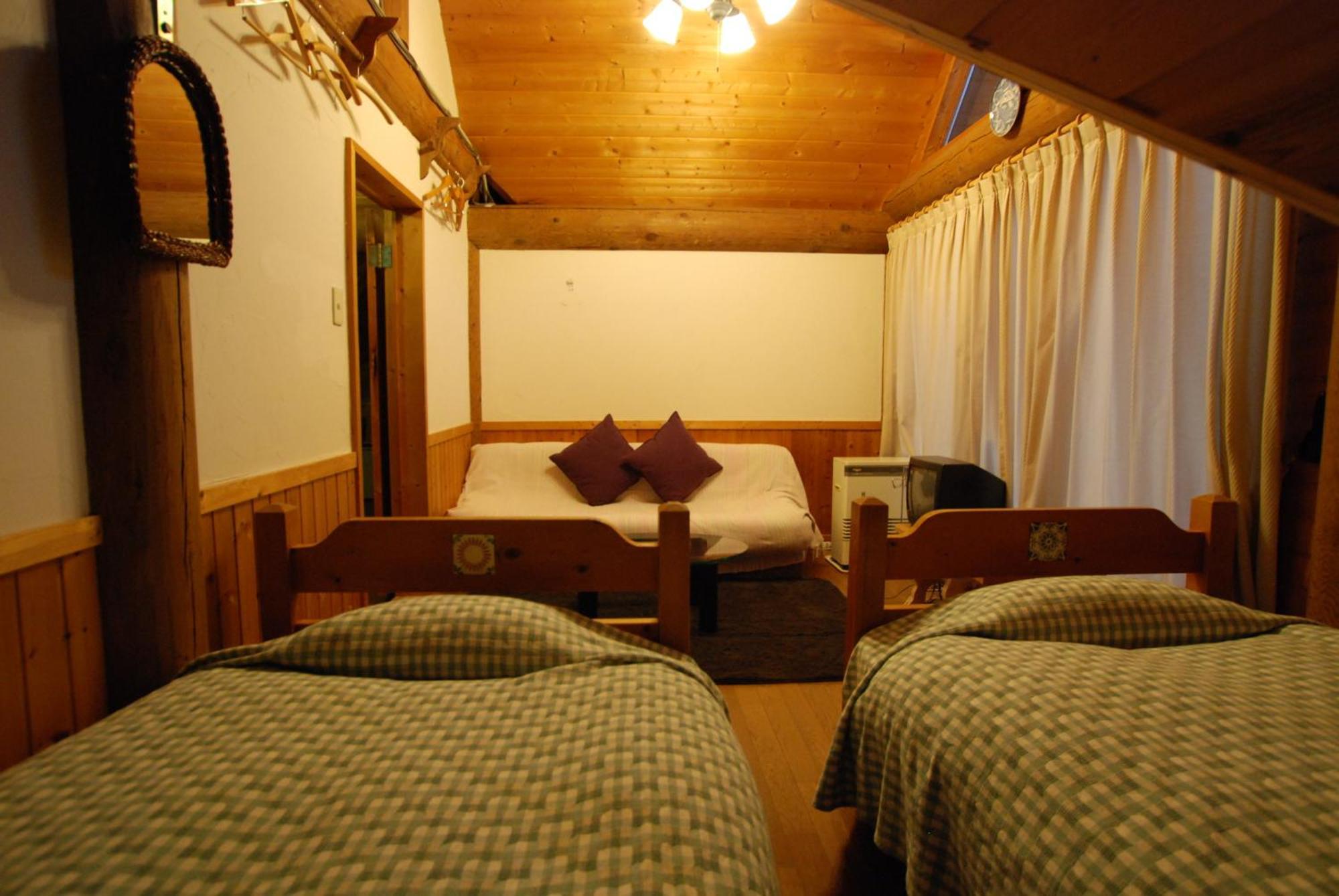 Pension Woody Note Niseko Pokoj fotografie